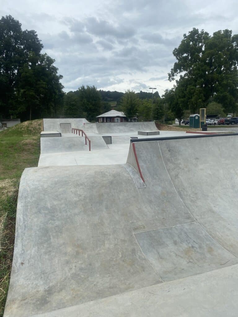 Skatepark featuring ramps, rails, and bowls fostering community engagement and outdoor activity.