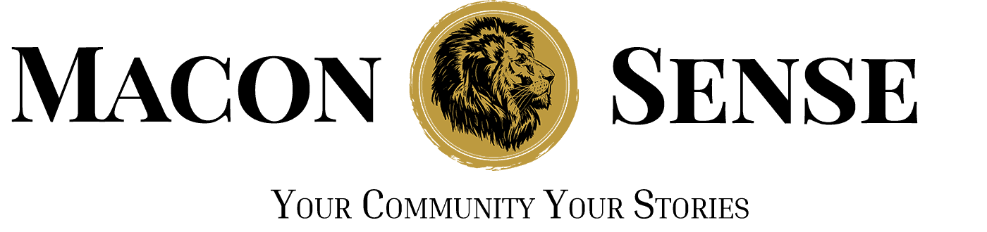 Macon Sense logo featuring a lion emblem, representing strength and community.