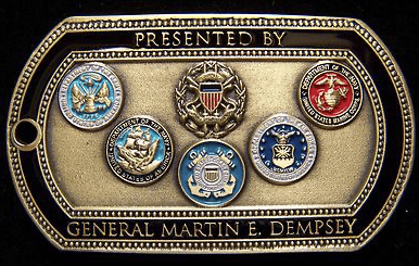 Military veteran medal with emblems honoring service and brotherhood.