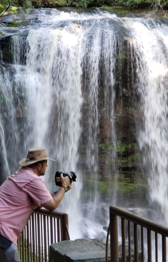 Photographer capturing waterfall scene at Franklin location.