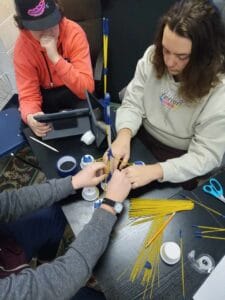 Students engaging in hands-on STEM activity at Bartram Academy.