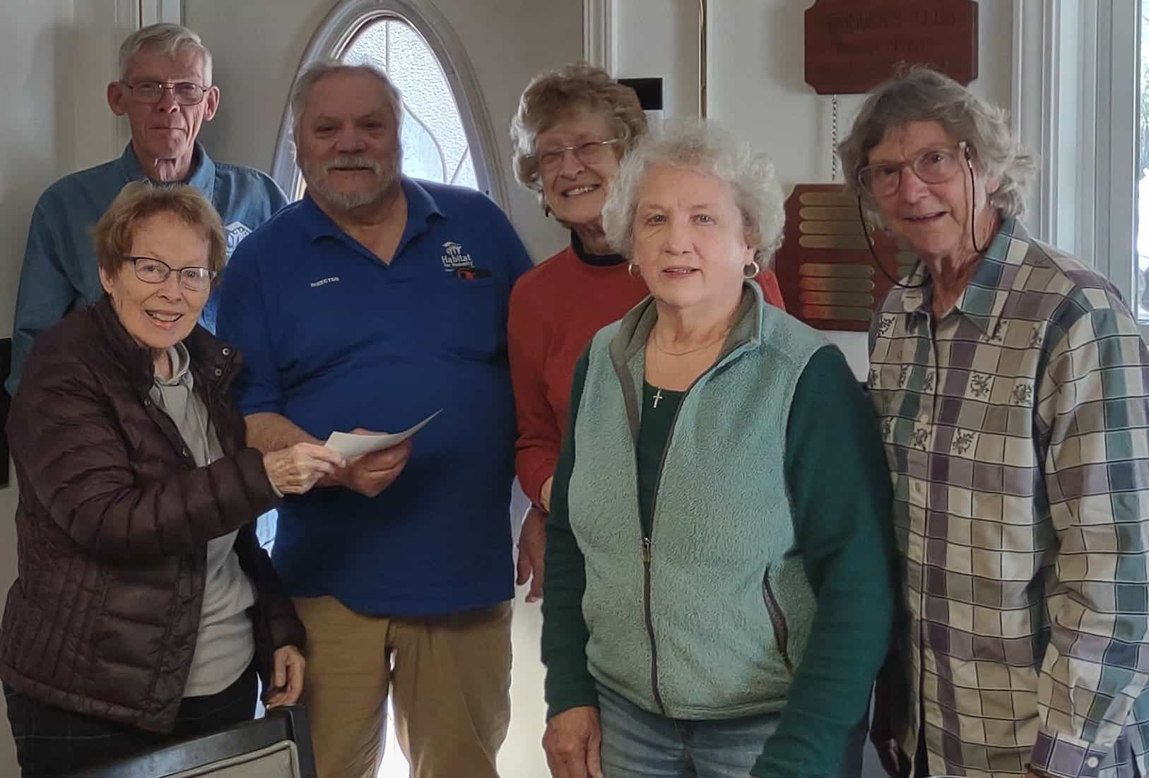 Check presented to Habitat for Humanity