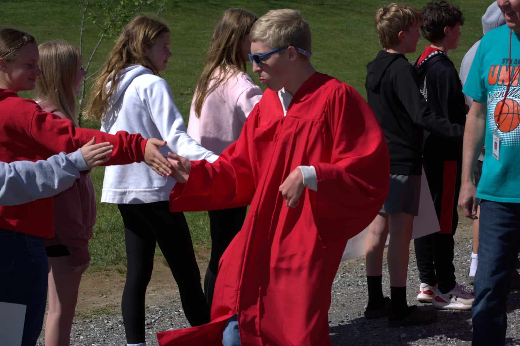 Students cheer for senior classes