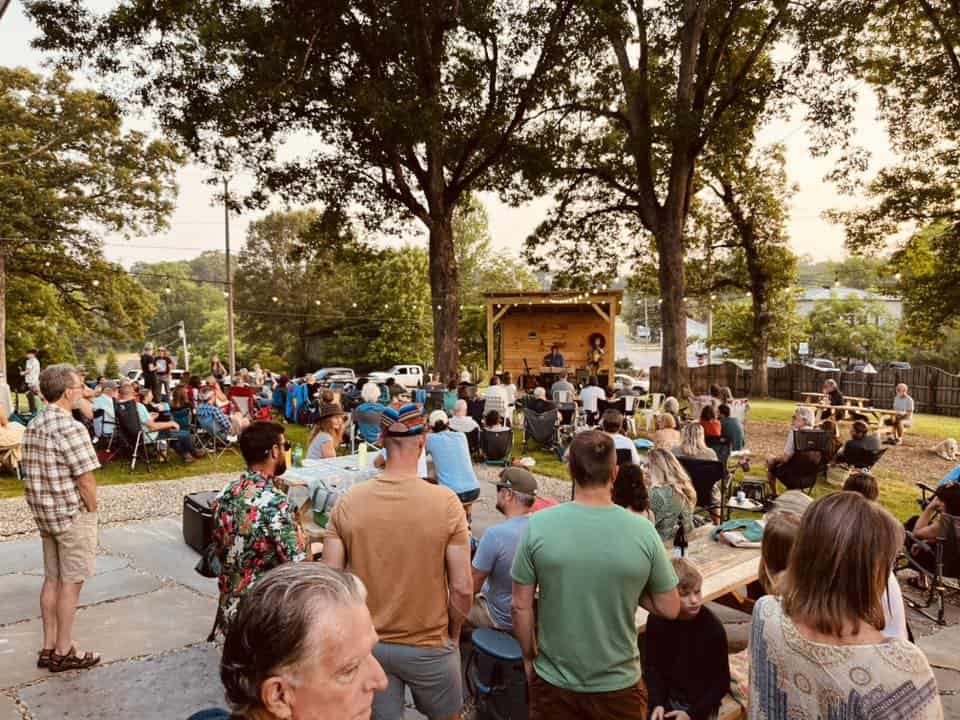 Community outdoor concert event in Macon with live music and audience.