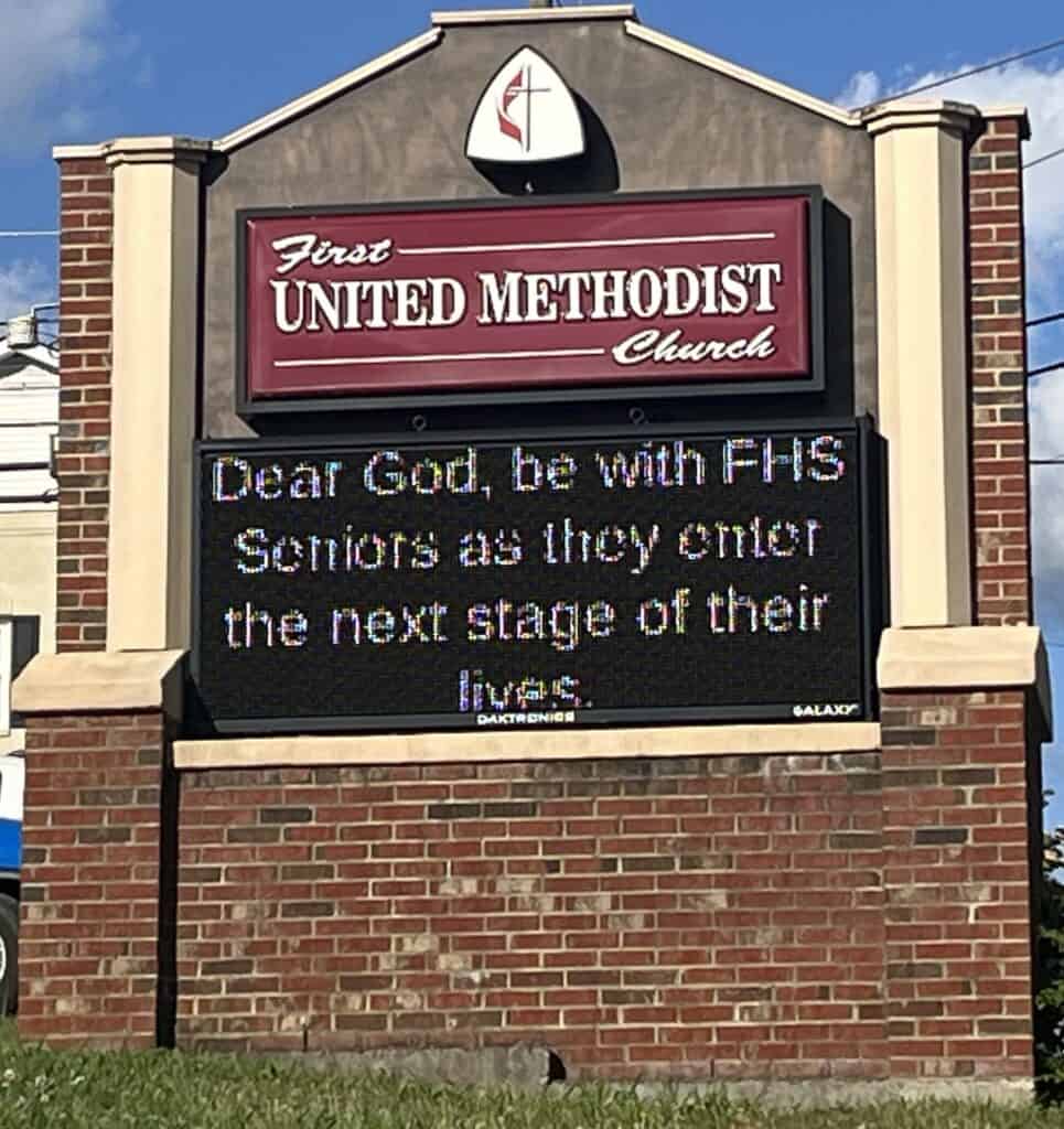 Digital sign at First United Methodist Church supporting seniors' transition.