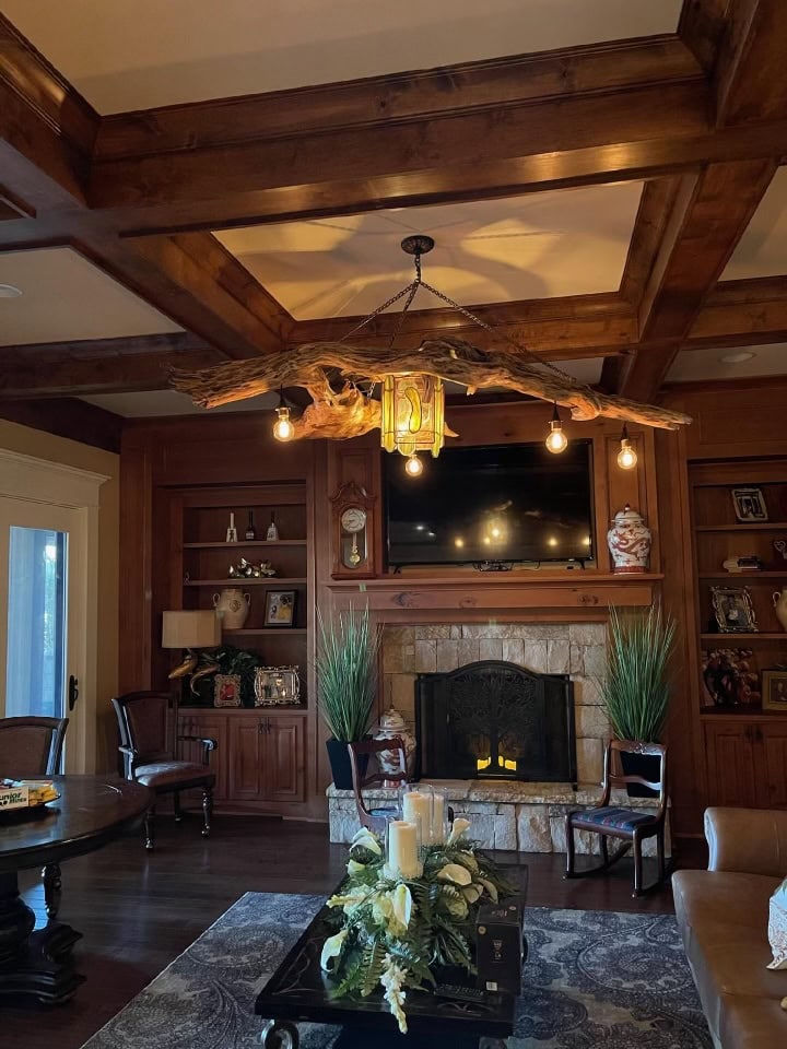 Elegant living room featuring Lampman lighting fixture made from local materials.