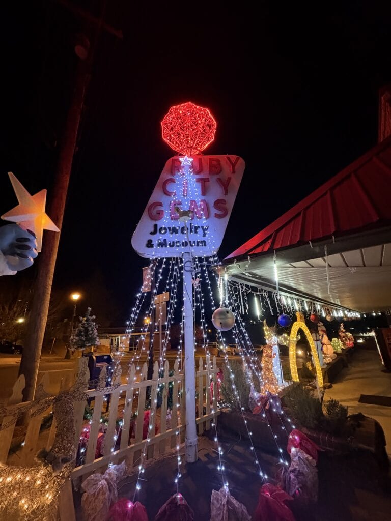 Ruby Drop New Year’s Eve celebration with vibrant red gemstone lights.