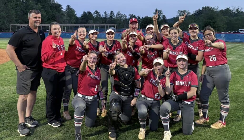 Franklin High School softball team celebrating after a game victory.