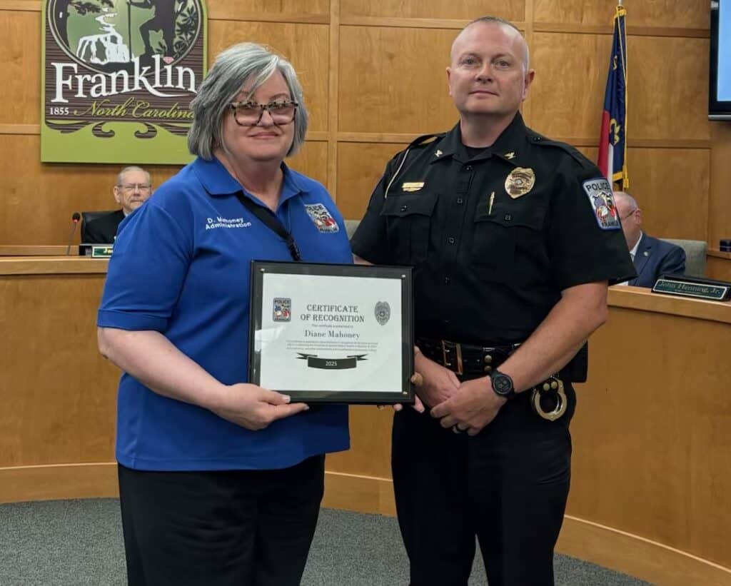 Fire chief awards top performers at council meeting in Franklin, North Carolina.