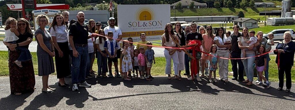 Chamber members and new business leaders at ribbon-cutting event in Macon.
