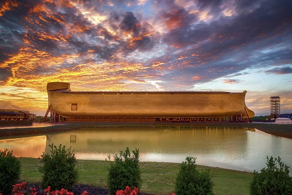 Ark Encounter and Creation Museum replica at sunset.