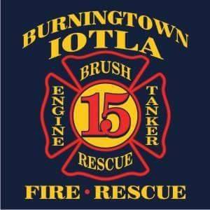 Burningtown IOTLA Fire & Rescue badge with 15-year service emblem.
