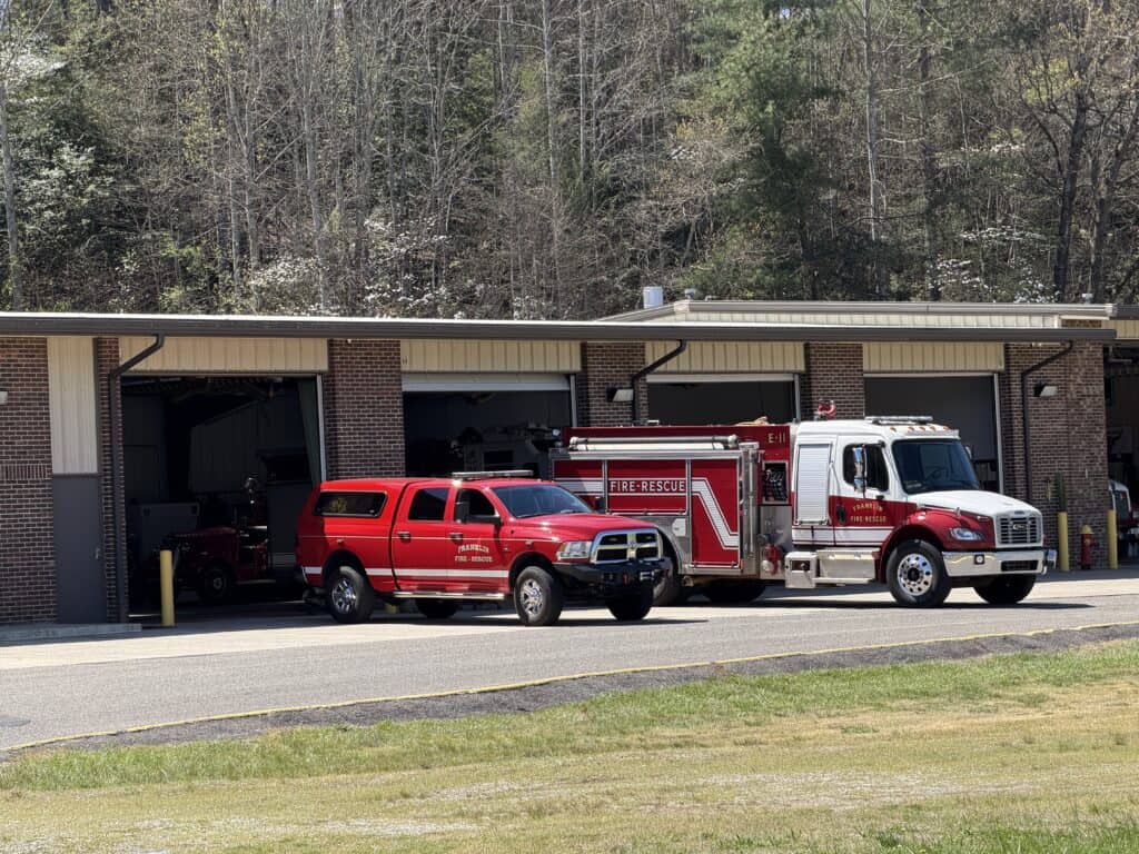Fire department vehicles parked outside a fire station in Macon.
