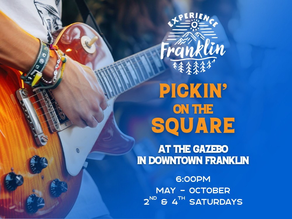 Live guitar performance at Franklin's Pickin' on the Square event.