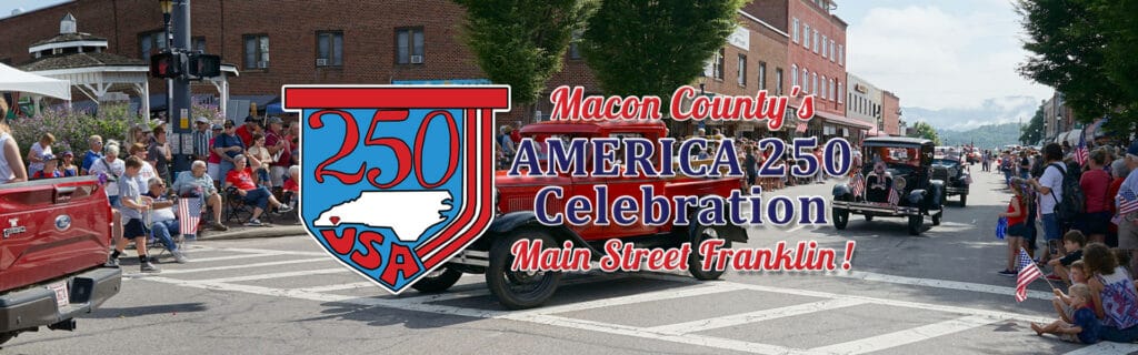 Crowd watching Macon County's 250th America celebration parade in Franklin.