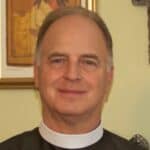 Fr E.R. Haire, Jr., PhD