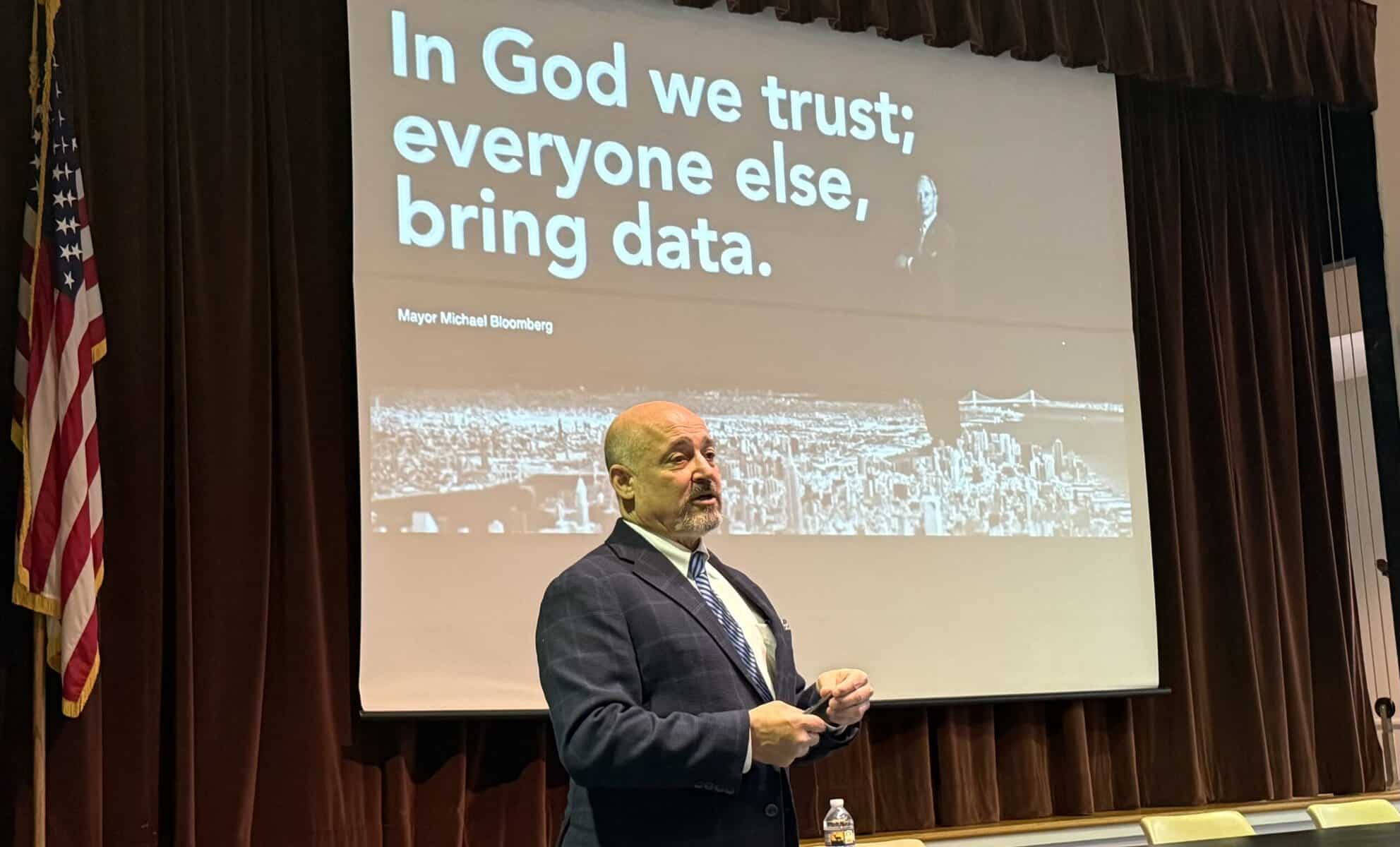 Speaker at Macon Sense event discussing trust and data in leadership.