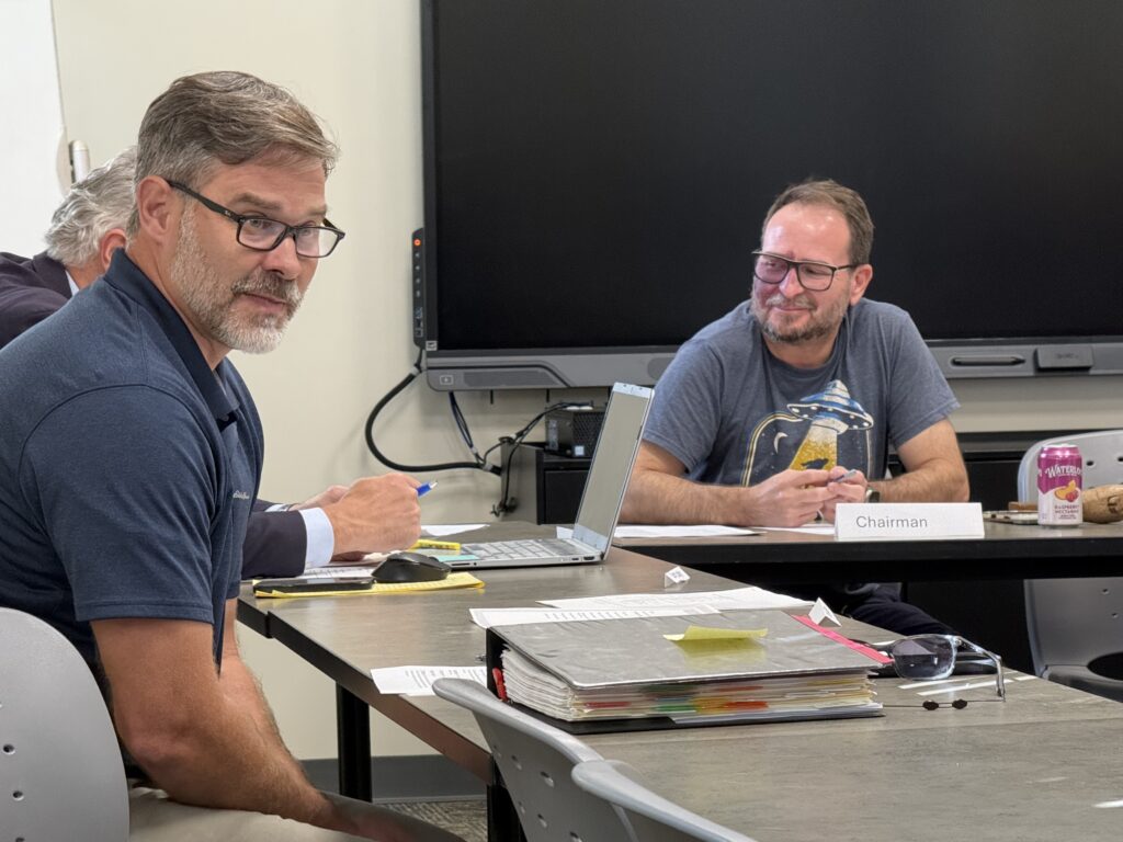 City officials discuss data center regulations at Macon meeting.