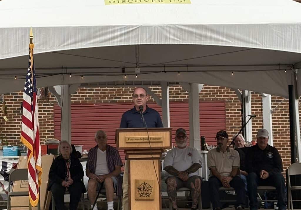 Veterans gathered at a ceremony for a special day celebration.
