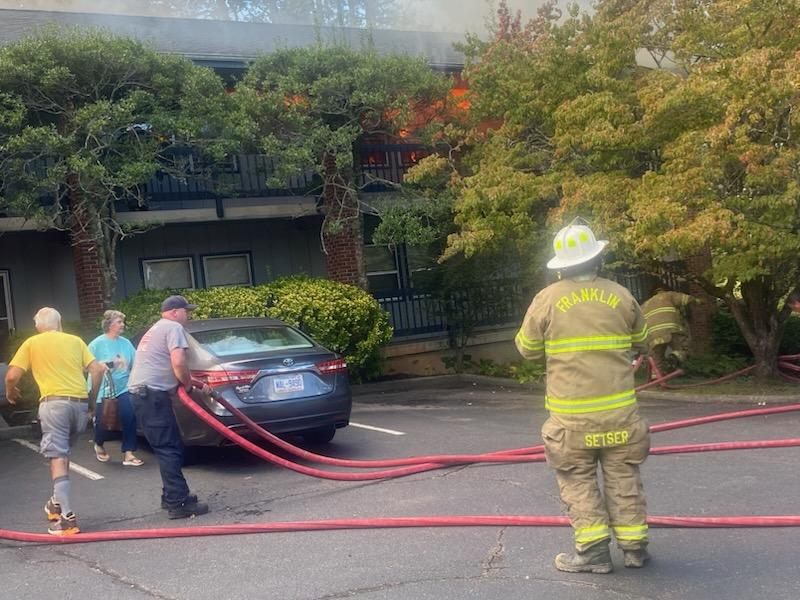 One person rescued from Harrison Garden Apartments fire