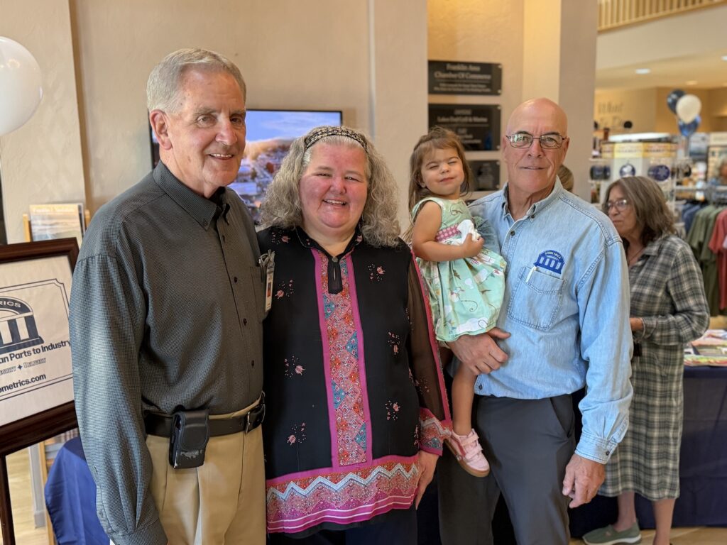 Family group photo at Macon Sense store, smiling and enjoying shopping.