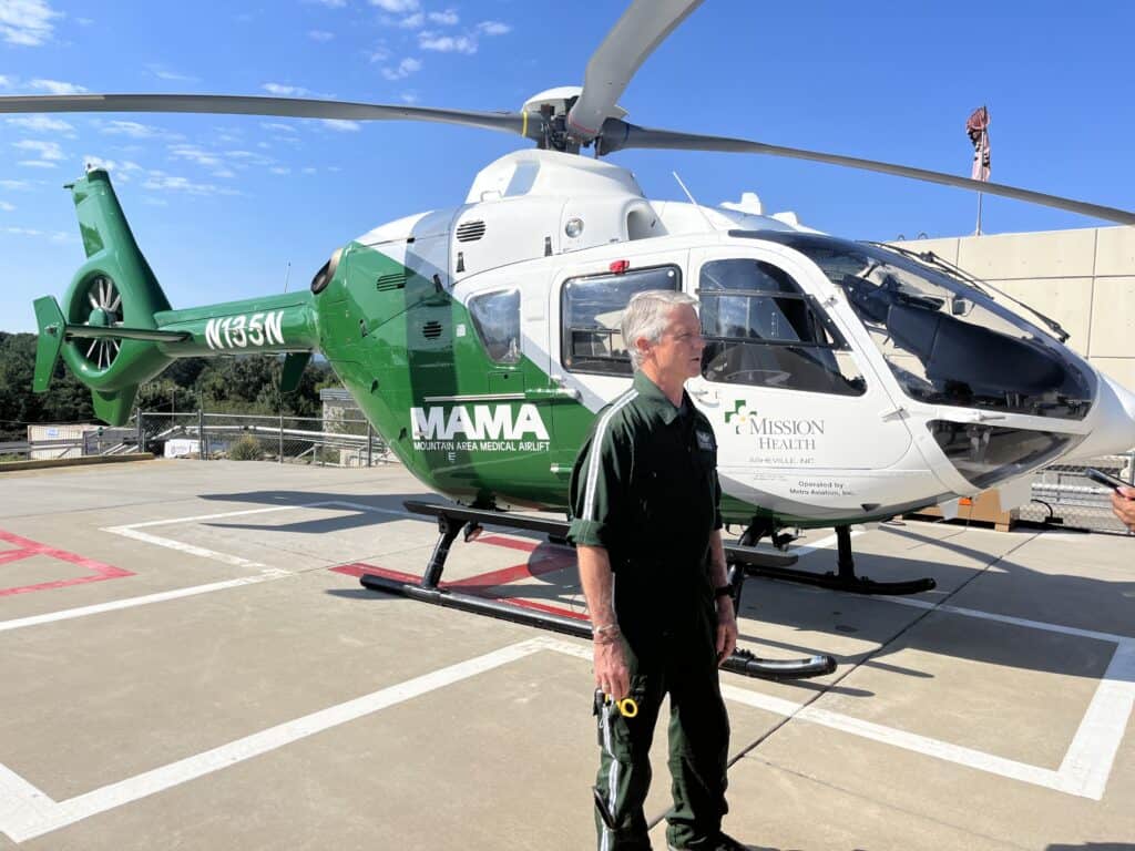MAMA helicopter at hospital helipad for critical care transport.