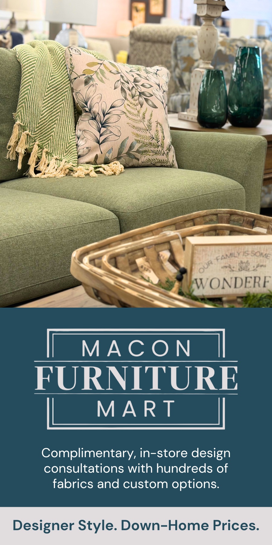 Stylish green sofa with decorative pillows and vases in a modern interior setting.