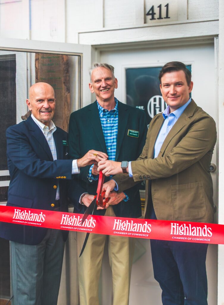 Three men at Highlands Chamber of Commerce ribbon-cutting event.