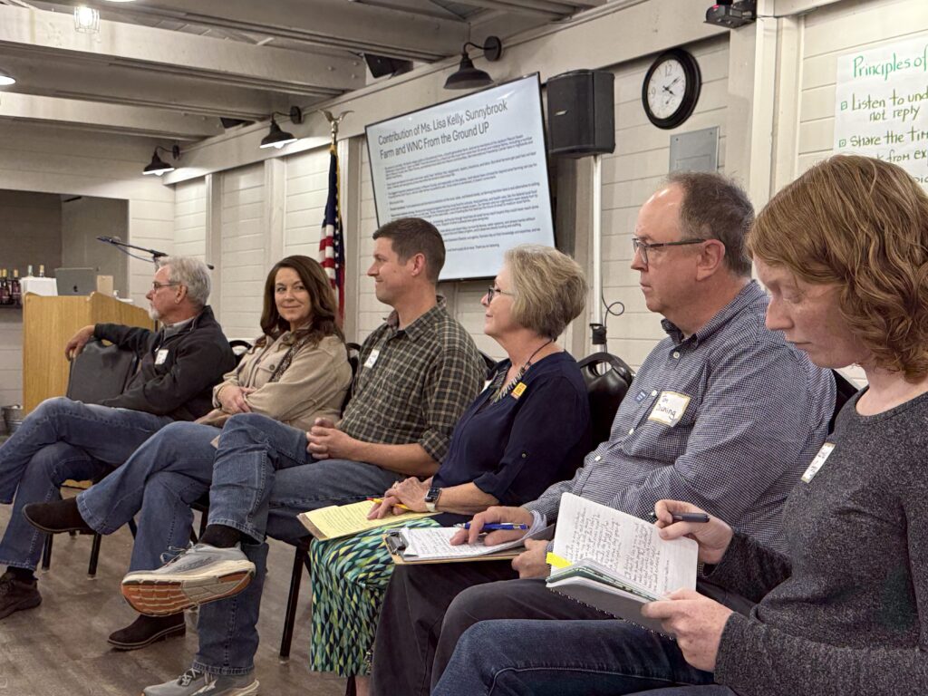 Panel discussion at Macon Sense event about housing affordability and solutions.