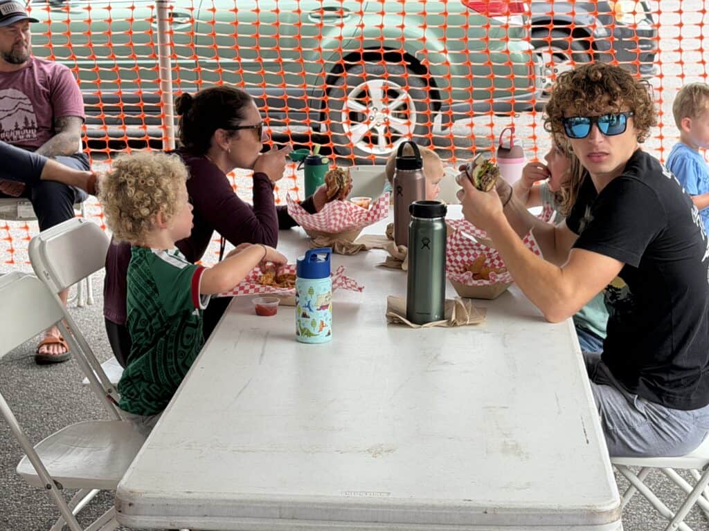 Family having fun at fall festival with kids and friends in Franklin.