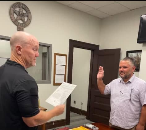Deputy being fired in an office setting for license plate reader misuse.